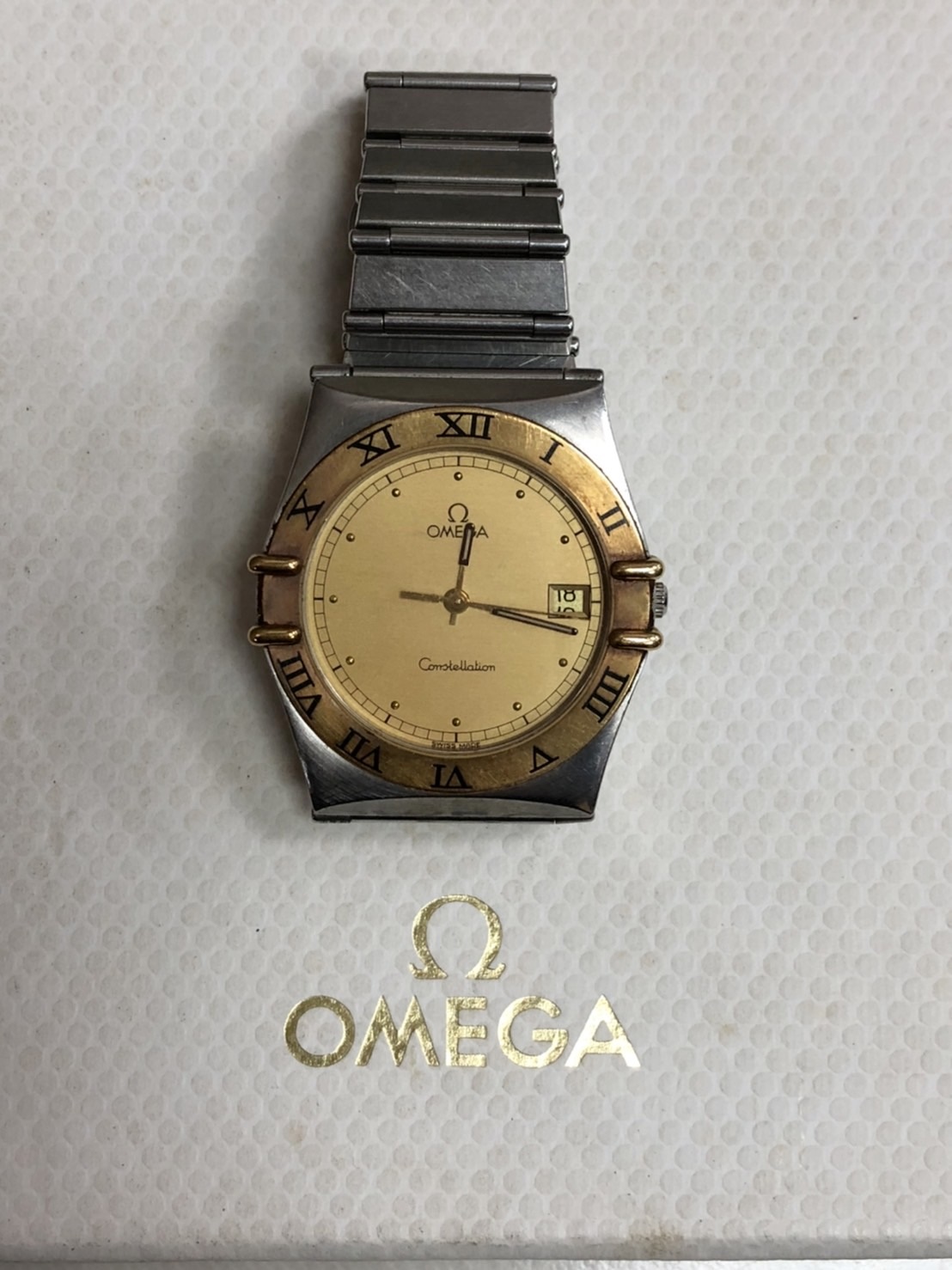 OMEGA